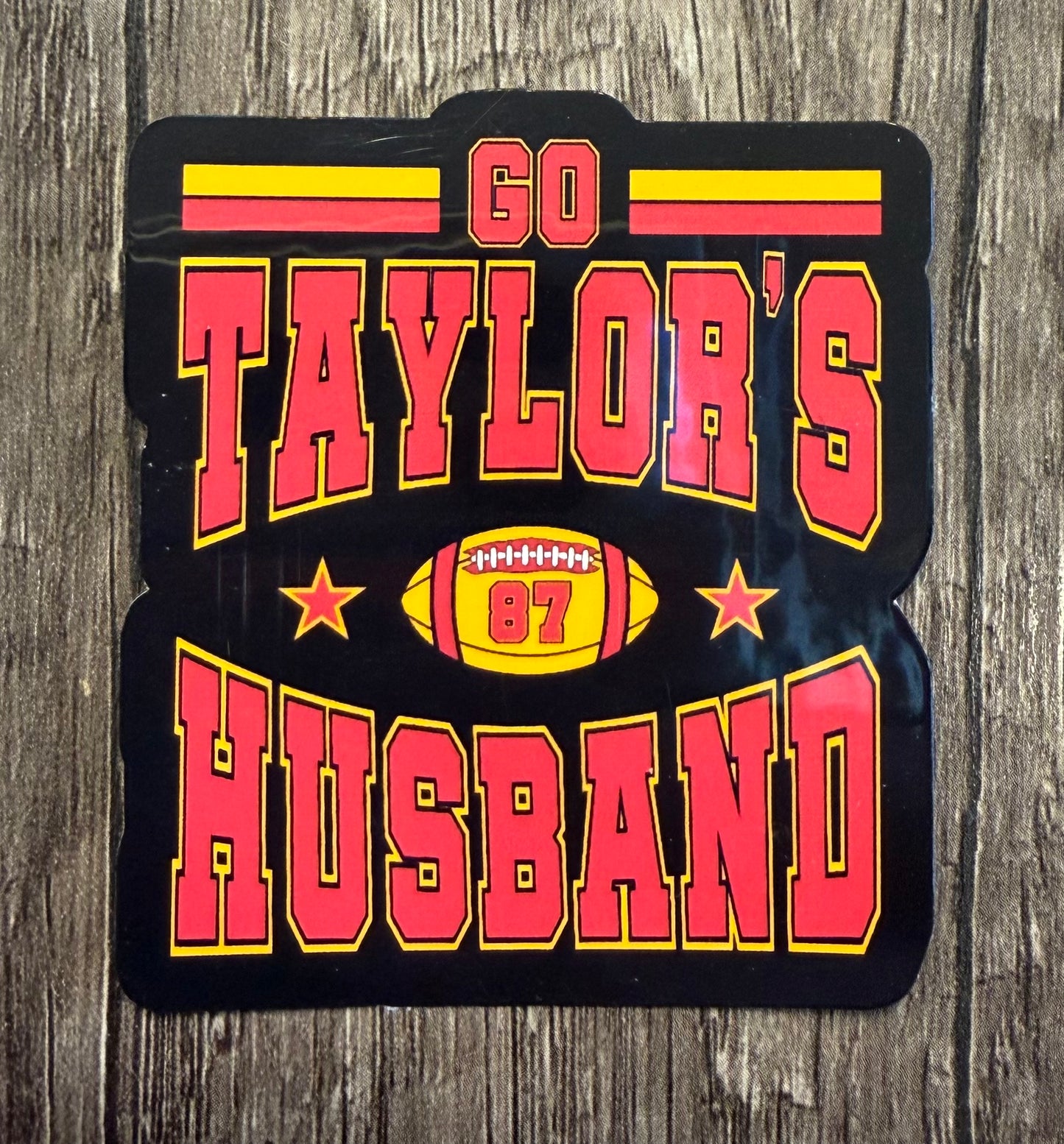 GO TAYLOR'S HUSBAND STICKER