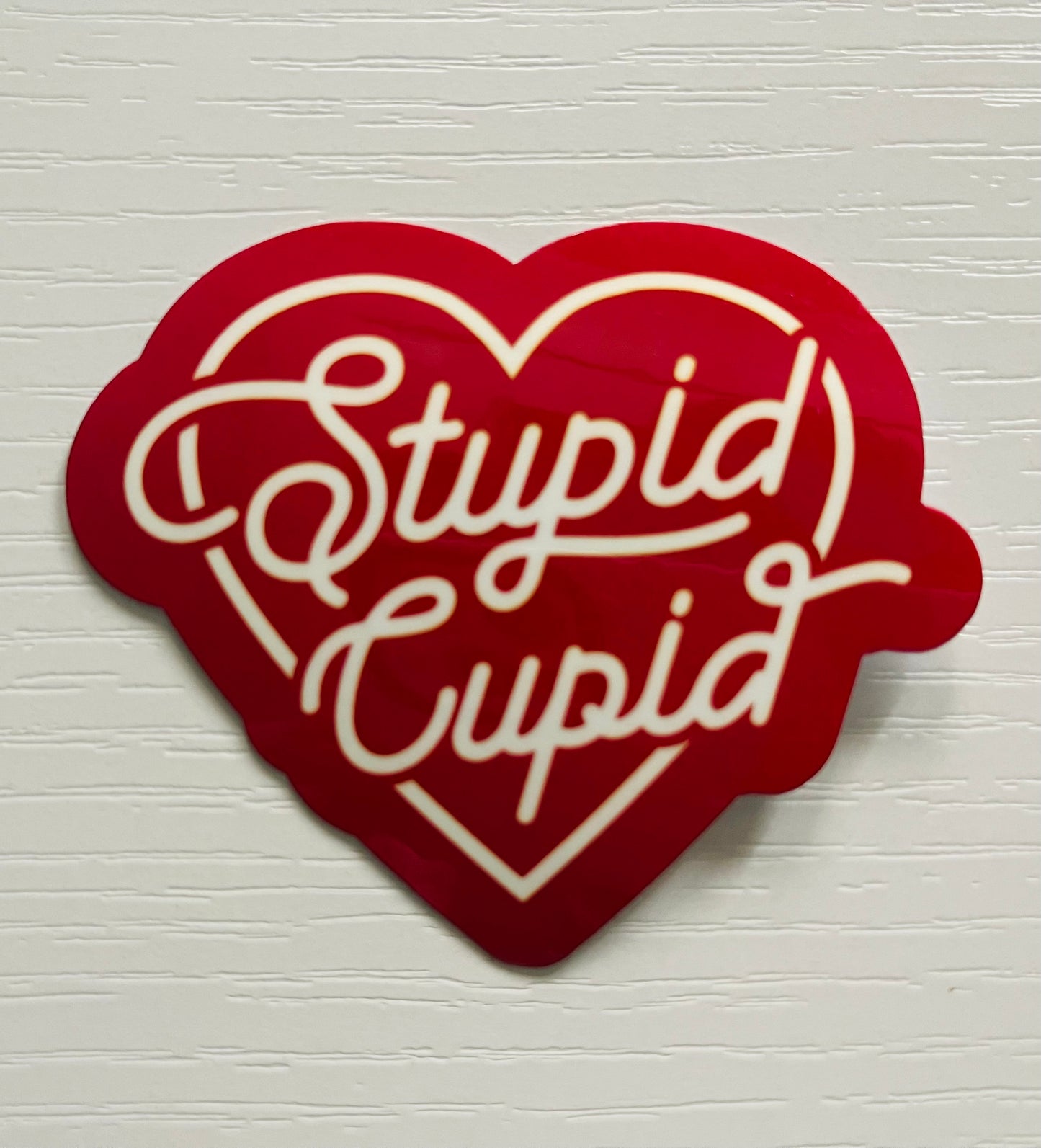 STUPID CUPID STICKER
