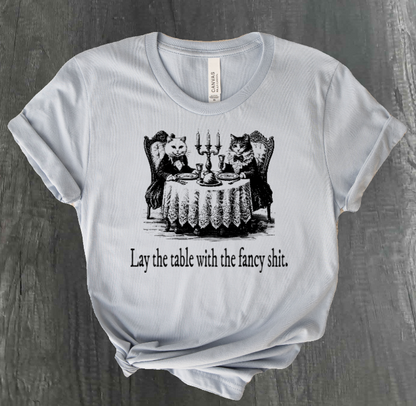 PON LA MESA CON LA CAMISETA DE GATOS FANCY SHIT