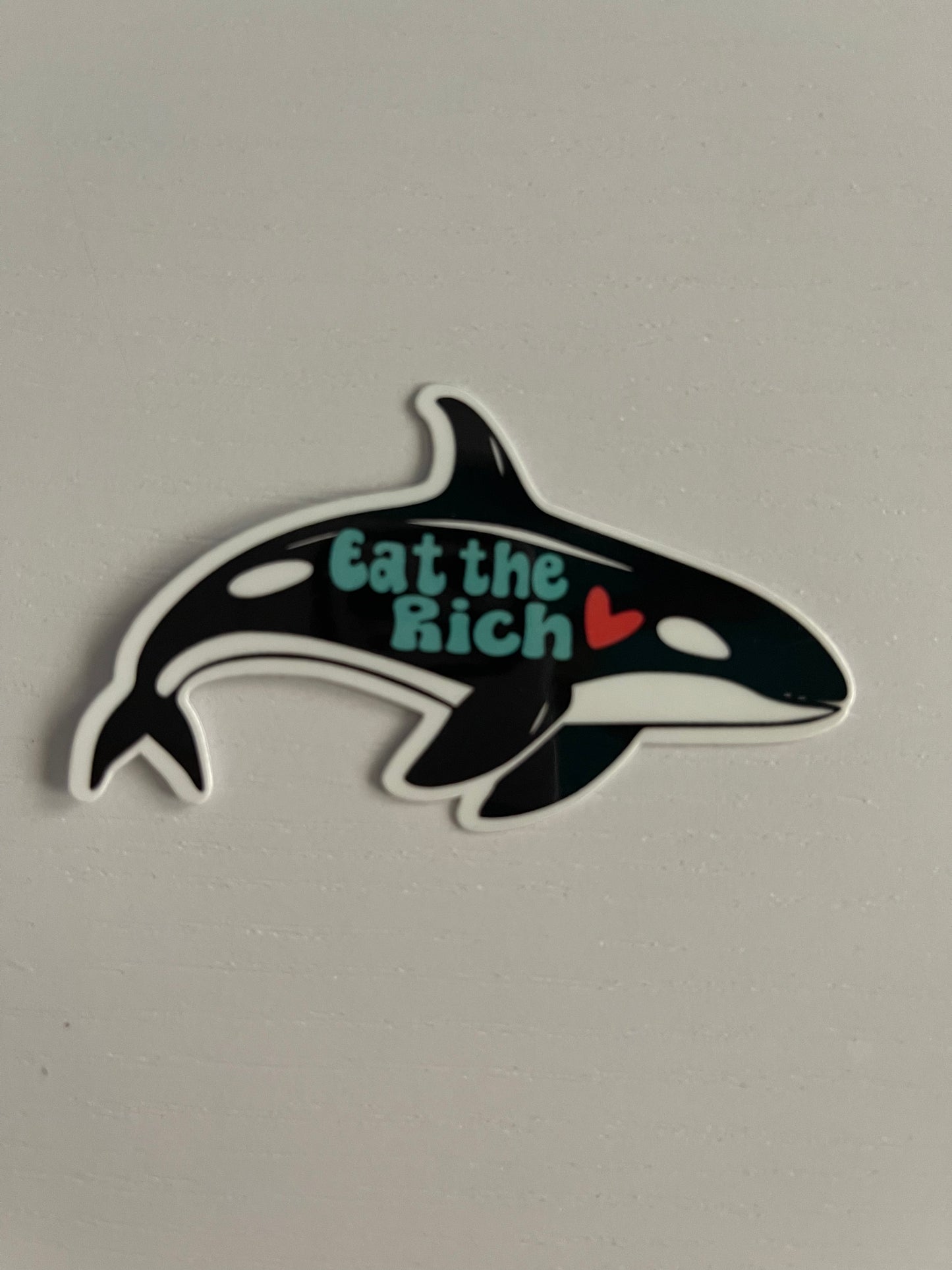 EAT THE RICH ORCA STICKER