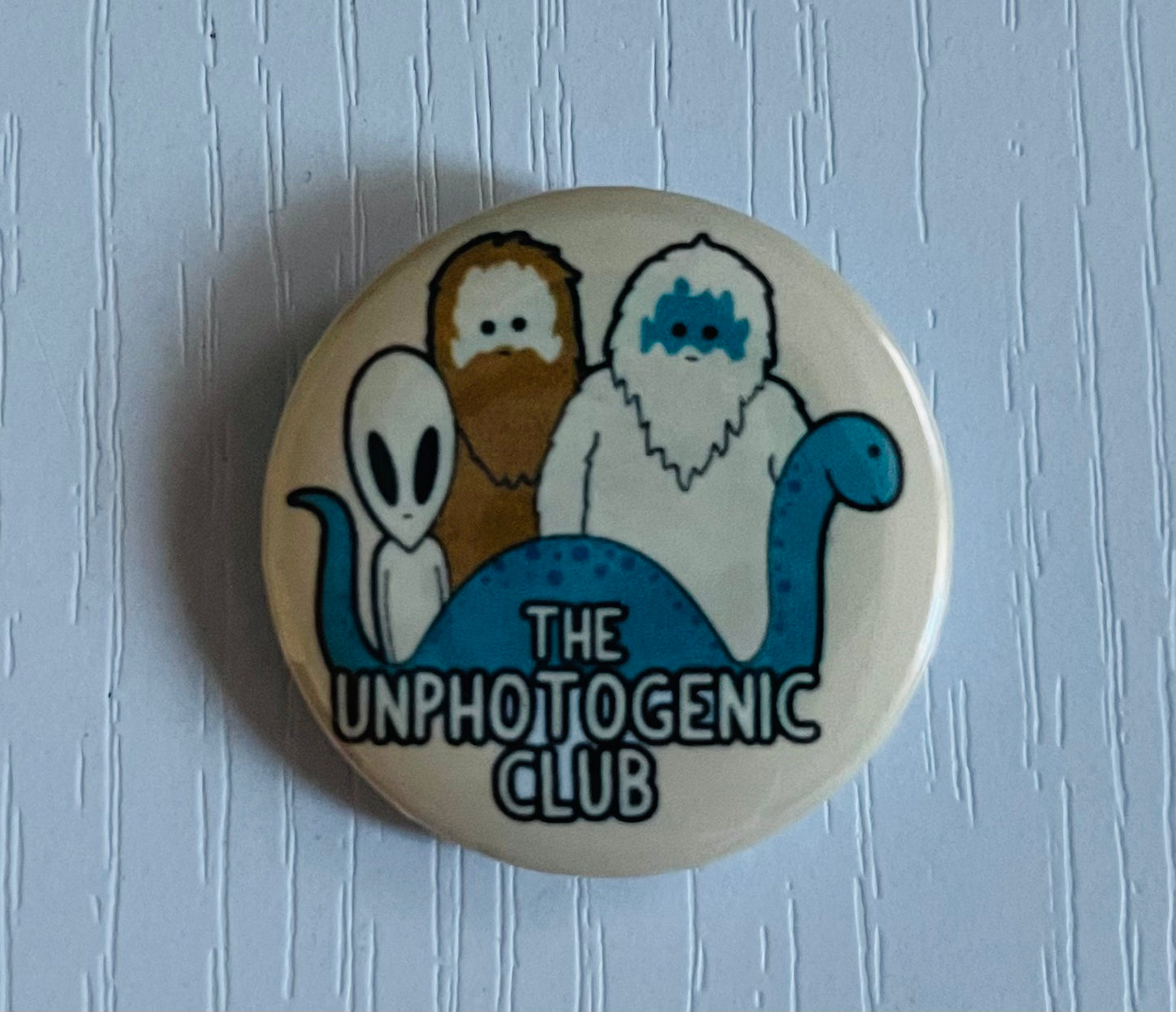 THE UNPHOTOGENIC CLUB BUTTON/MAGNET